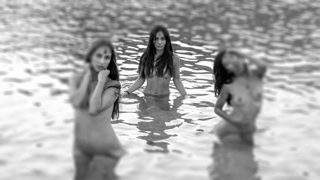 Adina Nicola naked in water with friends